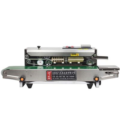 Afdichten van koffiezakjes met datum afdrukken met behulp van stikstof gas spoelen Continuous Band Sealer