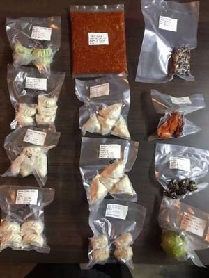 Vacuümverpakkingsmachine voor vlees met een dubbelkamerscontinuumvacuümdichtingsoplossing