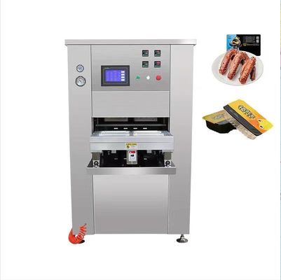 Verpakkingsmachine voor het afdichten van bakken van roestvrij staal