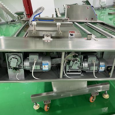 Grote capaciteit Automatische continue roterende rollende riem Voedsel Kaas Zeevruchten Vlees Varkensvlees rundvlees Vacuümverpakkingsmachine